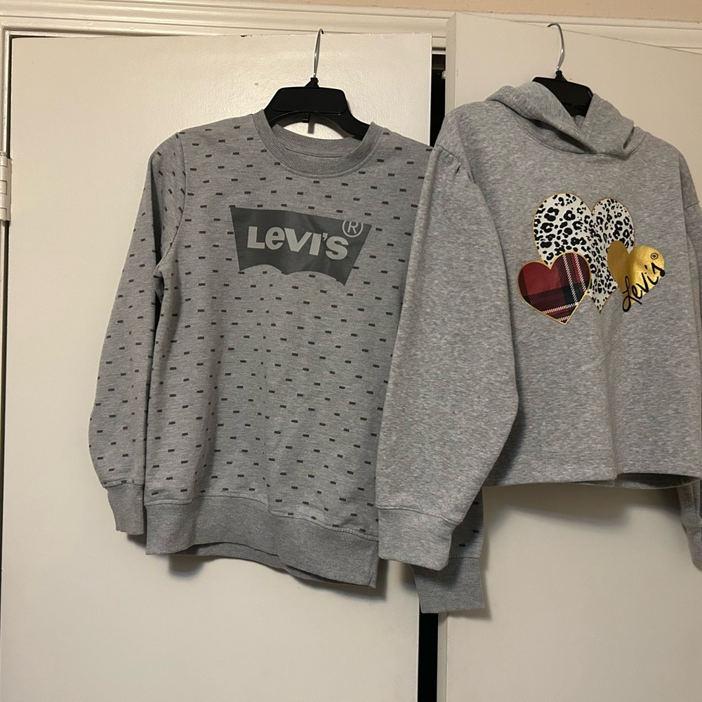 Girls gray Levi’s sweaters. One with the hood is more cropped.